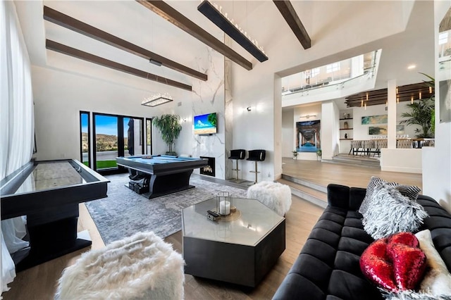 30402 Marbella, San Juan Capistrano, CA 92675 - living area with a towering ceiling, pool table, wood finished floors, and beamed ceiling