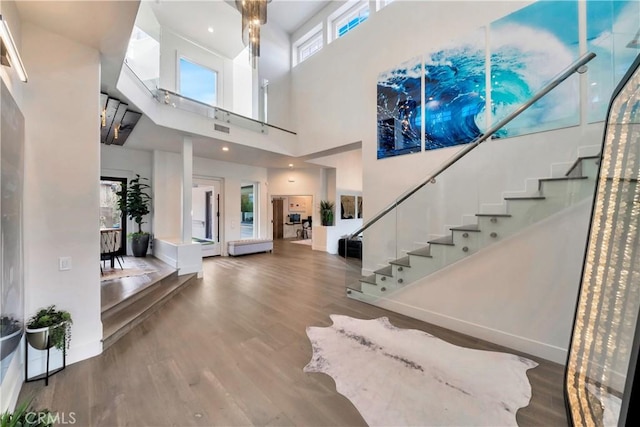 30402 Marbella, San Juan Capistrano, CA 92675 - foyer featuring wood finished floors, stairway, and a towering ceiling