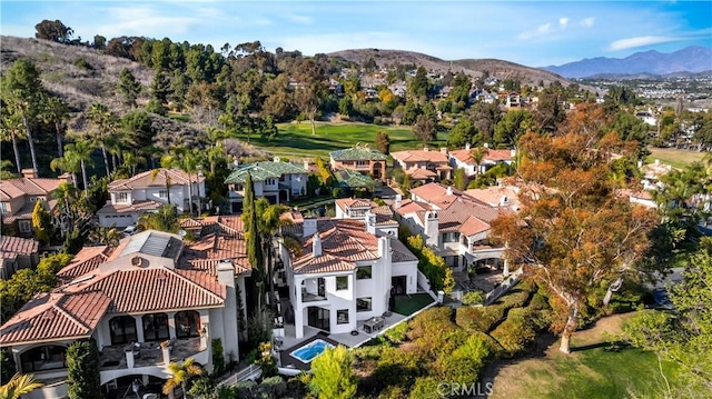 30402 Marbella, San Juan Capistrano, CA 92675 - aerial overview of property's location with a mountainous background and nearby suburban area