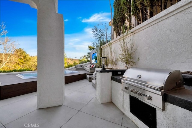 30402 Marbella, San Juan Capistrano, CA 92675 - view of patio / terrace featuring an outdoor hot tub and exterior kitchen