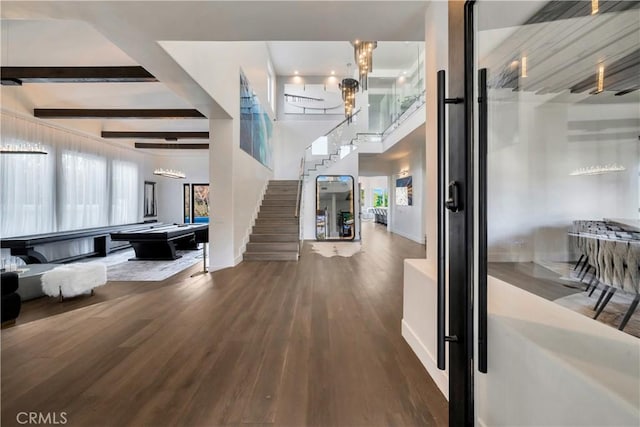 30402 Marbella, San Juan Capistrano, CA 92675 - entryway featuring pool table, wood finished floors, stairs, a towering ceiling, and beam ceiling