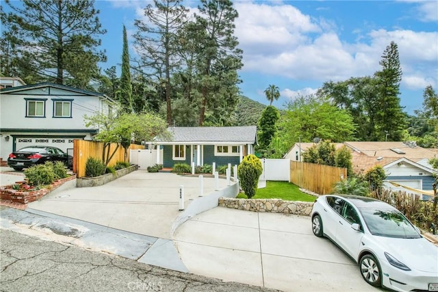 5624 Freeman Ave, La Crescenta, CA 91214 - view of front of house with a fenced front yard and driveway