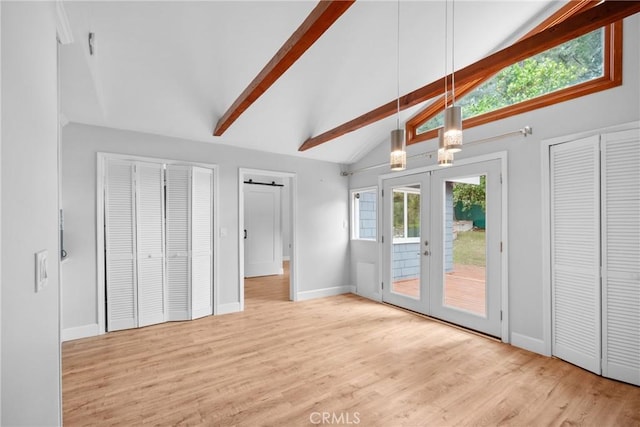 5624 Freeman Ave, La Crescenta, CA 91214 - unfurnished bedroom with access to outside, french doors, light wood-style floors, baseboards, and a barn door