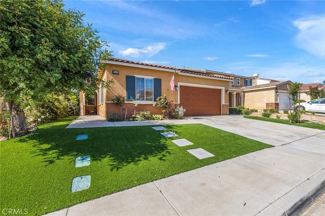 1316 Bannock St, Beaumont, CA 92223 - view of front of home with stucco siding, concrete driveway, a front lawn, and an attached garage
