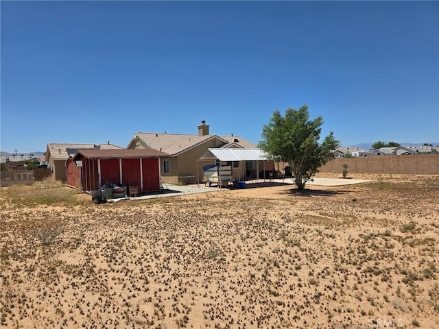 21224 Vidal Ct, Apple Valley, CA 92308 - back of house with a patio area