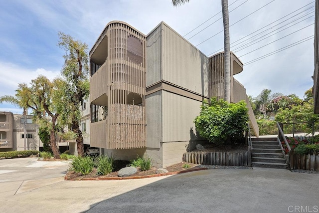 155 Rosebay Dr Unit 42, Encinitas, CA 92024 - view of building exterior with stairway