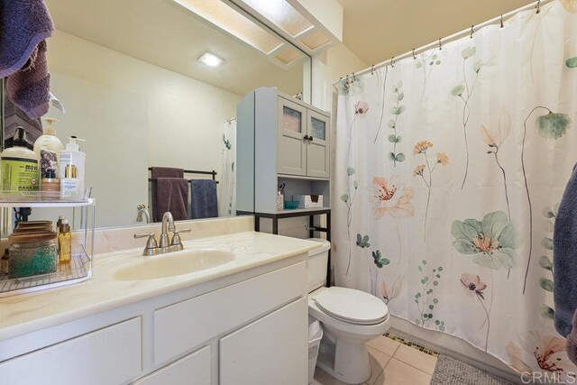 155 Rosebay Dr Unit 42, Encinitas, CA 92024 - full bathroom with tile patterned floors, toilet, and vanity