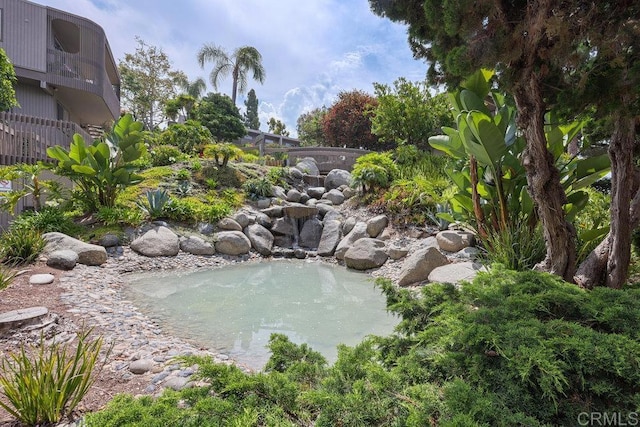 155 Rosebay Dr Unit 42, Encinitas, CA 92024 - view of yard with a garden pond