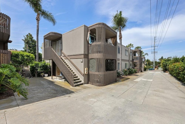 155 Rosebay Dr Unit 42, Encinitas, CA 92024 - view of building exterior featuring stairway