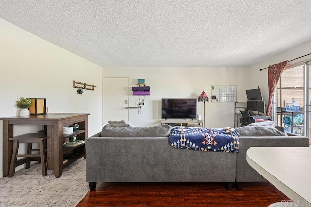 155 Rosebay Dr Unit 42, Encinitas, CA 92024 - living room with wood finished floors and a textured ceiling