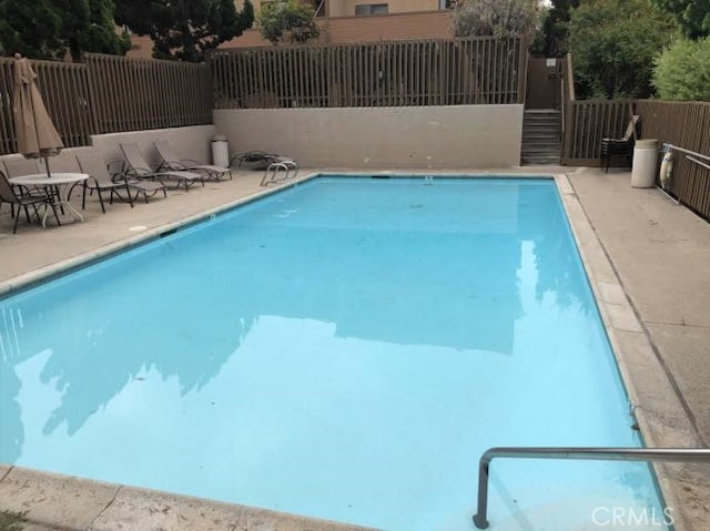 6188 Agee St Unit 230, San Diego, CA 92122 - community pool featuring a patio area