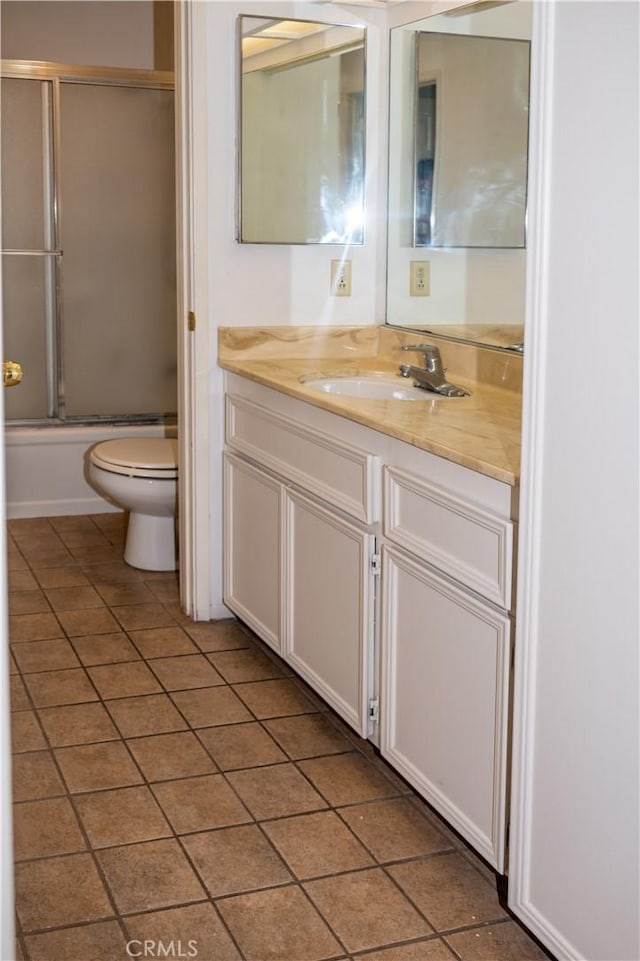 6188 Agee St Unit 230, San Diego, CA 92122 - full bathroom featuring vanity, tile patterned flooring, and shower / bath combination with glass door
