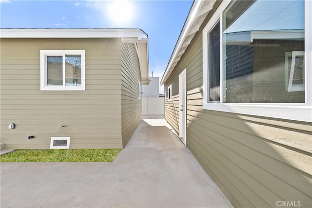 1027 E 10th St, Long Beach, CA 90813 - view of side of home featuring crawl space