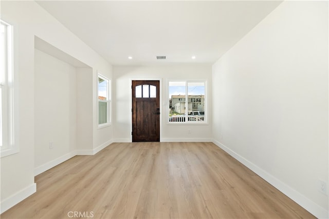 1027 E 10th St, Long Beach, CA 90813 - foyer entrance with light wood finished floors and recessed lighting
