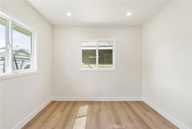 1027 E 10th St, Long Beach, CA 90813 - spare room featuring plenty of natural light, light wood-style flooring, baseboards, and recessed lighting