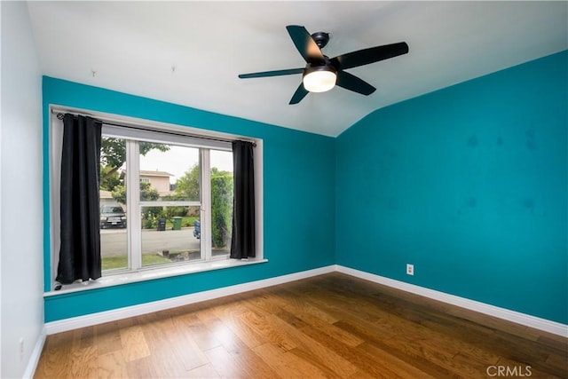 16243 Lisco St, Whittier, CA 90603 - empty room with baseboards, wood finished floors, vaulted ceiling, and a ceiling fan