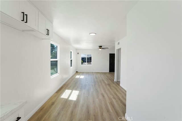 1212 Woodrow Ave, Bakersfield, CA 93308 - hall with light wood-type flooring and baseboards