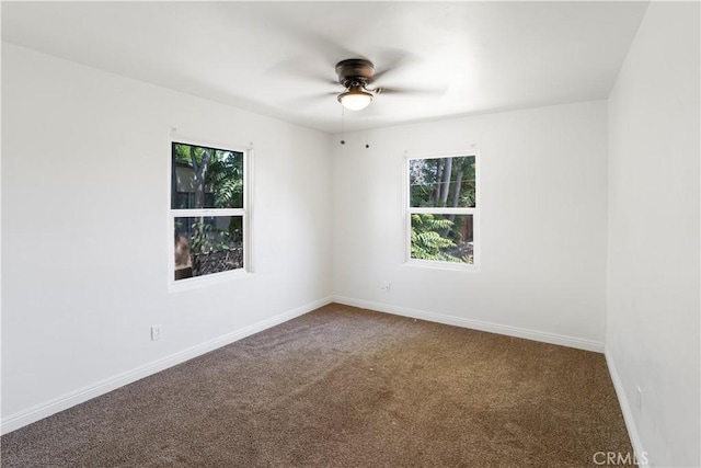 1212 Woodrow Ave, Bakersfield, CA 93308 - spare room with plenty of natural light, carpet floors, and a ceiling fan