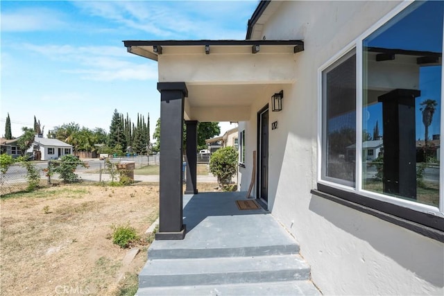 1212 Woodrow Ave, Bakersfield, CA 93308 - doorway to property with stucco siding
