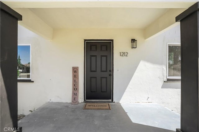 1212 Woodrow Ave, Bakersfield, CA 93308 - property entrance with stucco siding