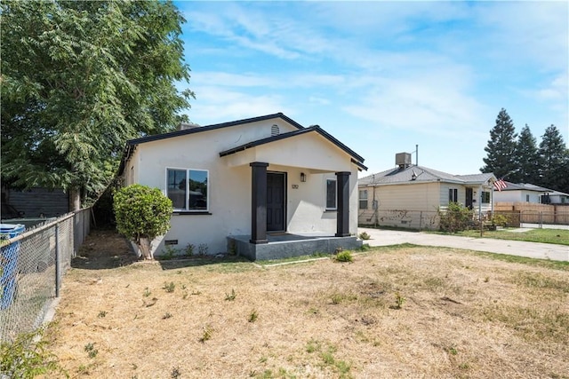 1212 Woodrow Ave, Bakersfield, CA 93308 - view of front of home with stucco siding