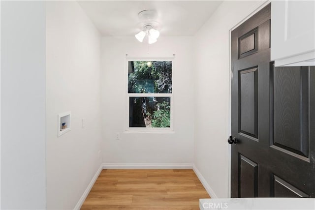 1212 Woodrow Ave, Bakersfield, CA 93308 - washroom featuring light wood finished floors, hookup for a washing machine, baseboards, and ceiling fan