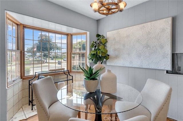 7860 La Fiesta Dr, Buena Park, CA 90620 - dining space featuring a chandelier and a decorative wall