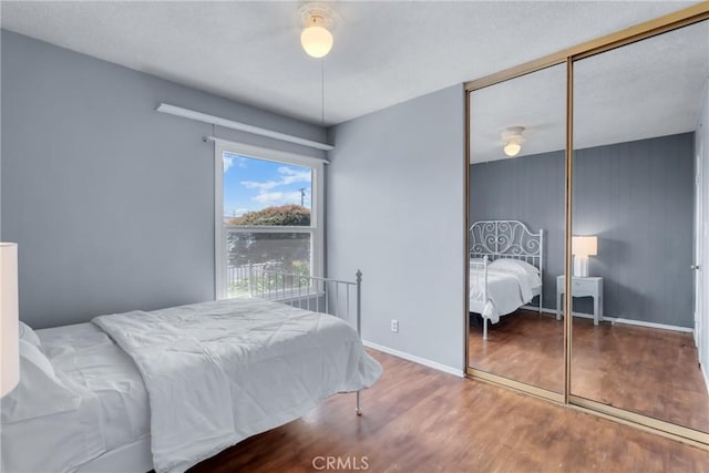 7860 La Fiesta Dr, Buena Park, CA 90620 - bedroom with wood finished floors, a closet, and baseboards