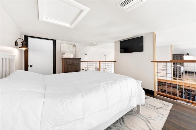 64952 Twentynine Palms Hwy, Joshua Tree, CA 92252 - bedroom with attic access and wood finished floors
