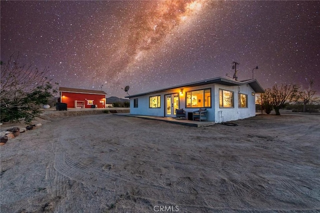64952 Twentynine Palms Hwy, Joshua Tree, CA 92252 - rear view of house featuring stucco siding