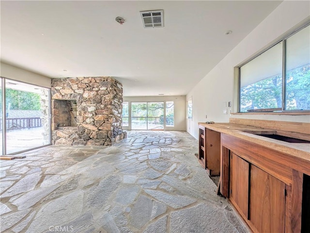 485 State Highway 173, Lake Arrowhead, CA 92352 - unfurnished living room with stone floors