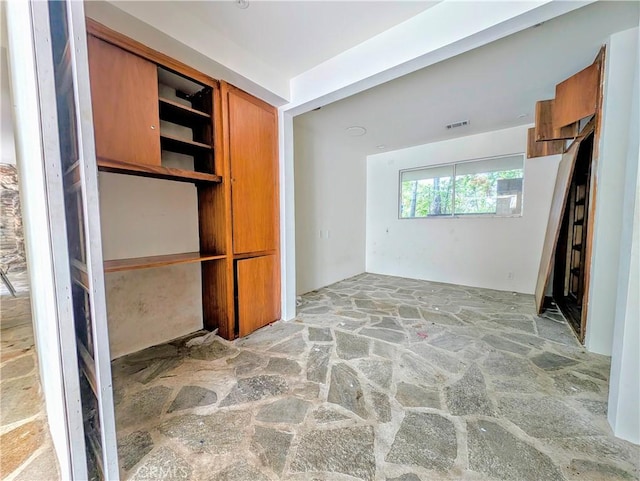 485 State Highway 173, Lake Arrowhead, CA 92352 - spare room featuring stone floors