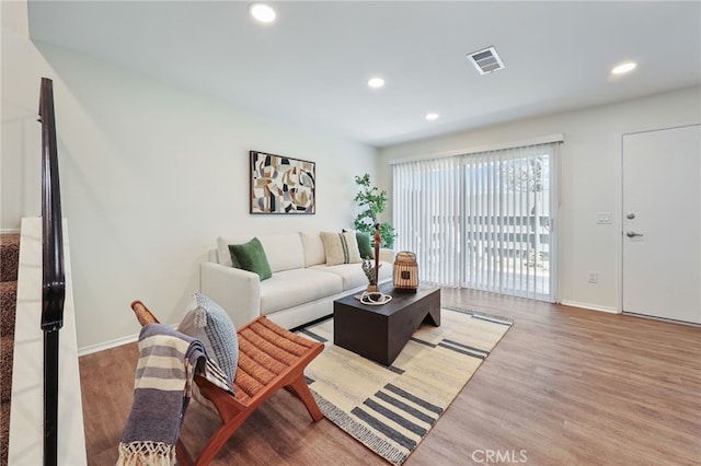 1634 Iowa St Unit B, Costa Mesa, CA 92626 - living area with wood finished floors, recessed lighting, and baseboards