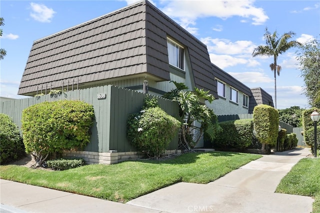 1634 Iowa St Unit B, Costa Mesa, CA 92626 - view of home's exterior featuring mansard roof
