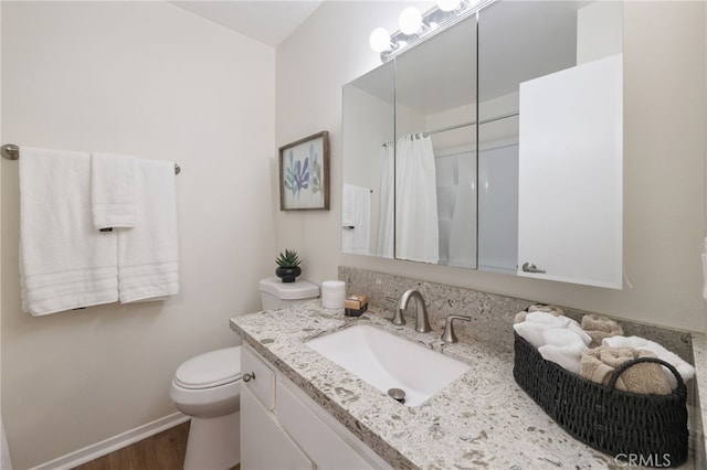 1634 Iowa St Unit B, Costa Mesa, CA 92626 - full bath featuring vanity, toilet, wood finished floors, baseboards, and a shower with shower curtain