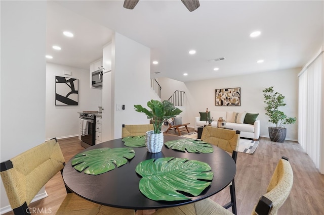 1634 Iowa St Unit B, Costa Mesa, CA 92626 - dining area featuring stairway, light wood-style flooring, recessed lighting, a ceiling fan, and baseboards