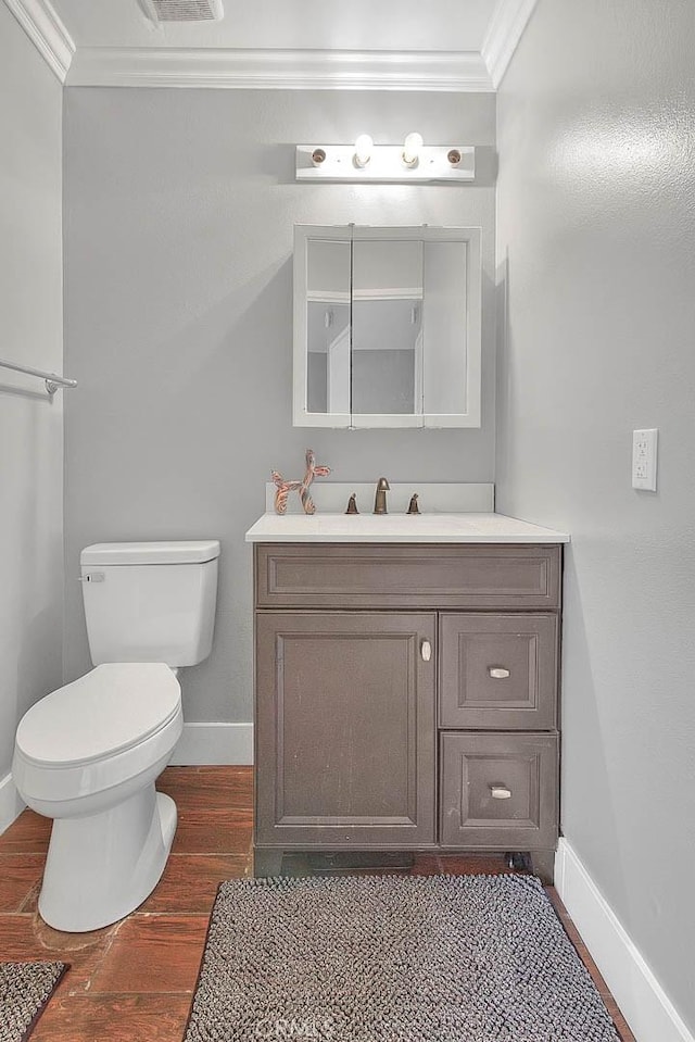 3421 Autumn Ave, Chino Hills, CA 91709 - bathroom with crown molding, baseboards, vanity, toilet, and wood finished floors