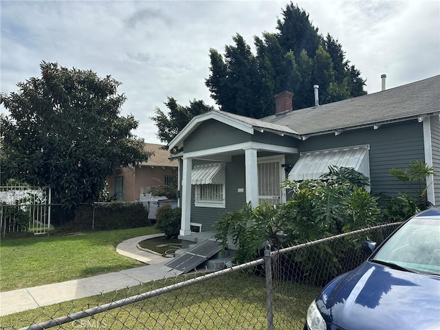 342 W 76th St, Los Angeles, CA 90003 - view of front of home featuring a chimney