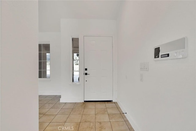 4426 Oil Well Rd, Phelan, CA 92371 - entrance foyer featuring light tile patterned floors and baseboards