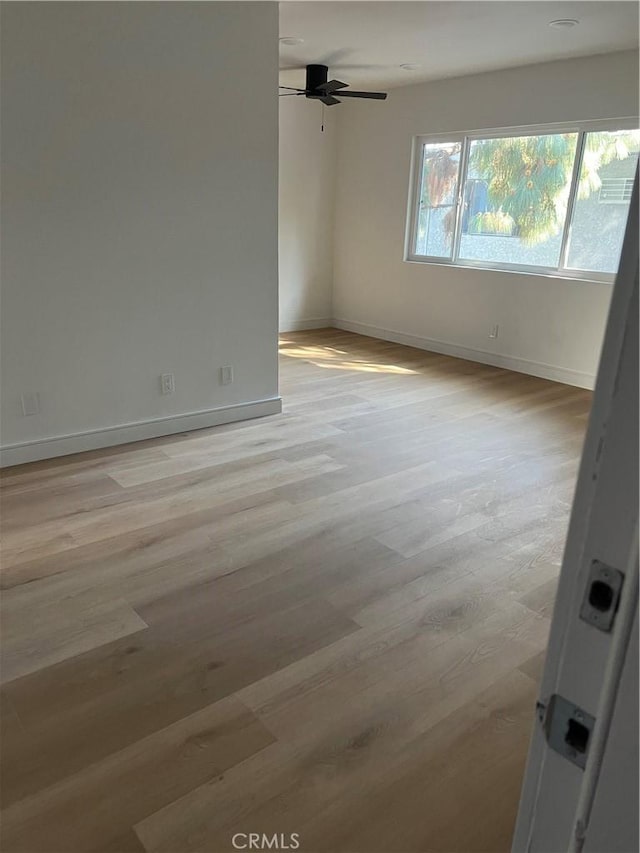 14805 Chase St Unit 224, Panorama City, CA 91402 - unfurnished room featuring baseboards, light wood-style floors, and ceiling fan