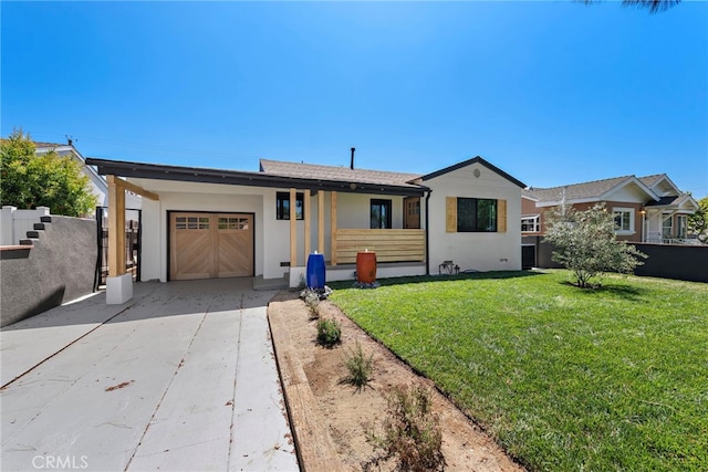 1506 N Niagara St, Burbank, CA 91505 - ranch-style house with driveway, an attached garage, stucco siding, and a front lawn