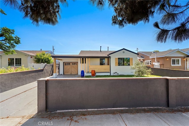 1506 N Niagara St, Burbank, CA 91505 - ranch-style house with a fenced front yard, an attached garage, and stucco siding