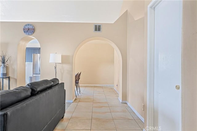 29039 Eveningside Dr, Castaic, CA 91384 - living room featuring arched walkways and baseboards
