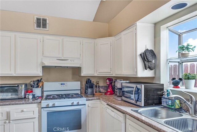 29039 Eveningside Dr, Castaic, CA 91384 - kitchen featuring white appliances, under cabinet range hood, a sink, and white cabinetry
