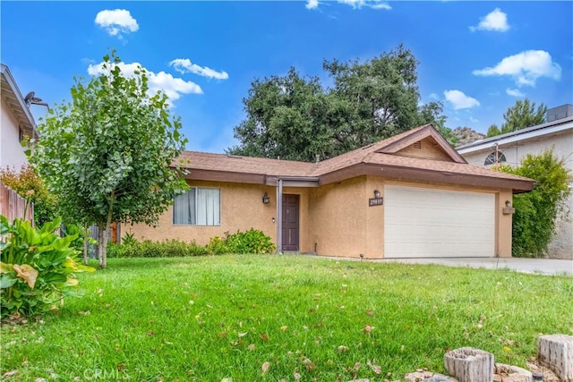 29039 Eveningside Dr, Castaic, CA 91384 - view of front facade featuring an attached garage, stucco siding, and a front yard