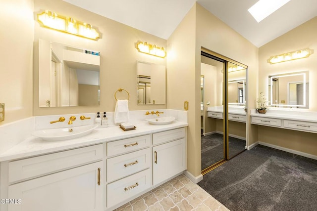 10484 Creek Rd, Oak View, CA 93022 - bathroom with double vanity and vaulted ceiling