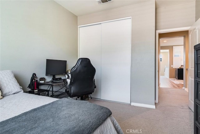 4765 Falconview Ct, Fontana, CA 92336 - carpeted bedroom with a closet and baseboards