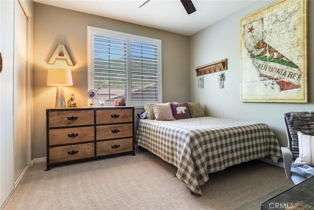 4765 Falconview Ct, Fontana, CA 92336 - bedroom with light carpet and ceiling fan