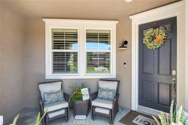 4765 Falconview Ct, Fontana, CA 92336 - property entrance with stucco siding and a porch