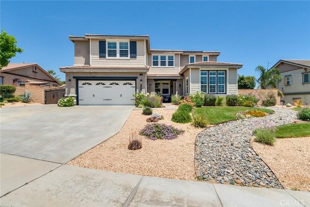 4765 Falconview Ct, Fontana, CA 92336 - traditional-style house with an attached garage, driveway, a gate, and stucco siding